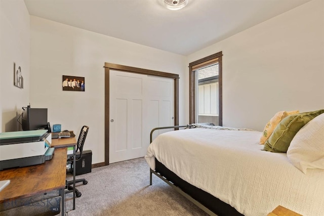 205 Albrey Trl Unit B, Bozeman, MT 59718 - bedroom featuring carpet floors, an office area, and a closet