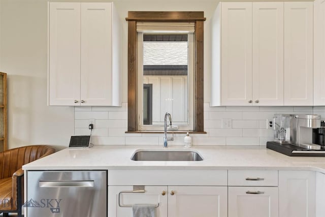 205 Albrey Trl Unit B, Bozeman, MT 59718 - kitchen with dishwasher, white cabinetry, decorative backsplash, and light stone countertops