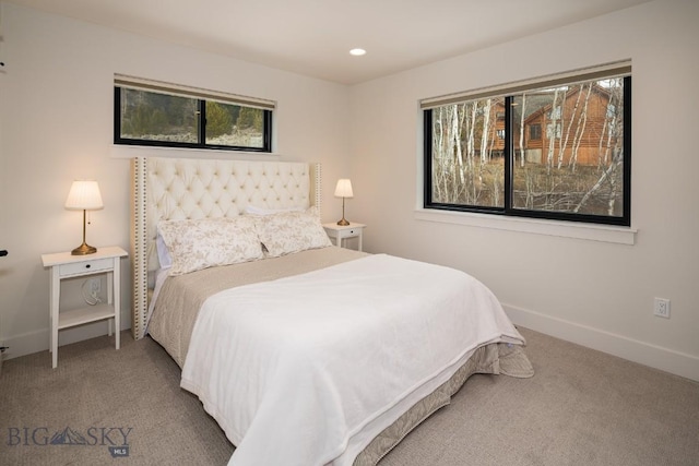 87 Upper Whitefish Dr, Big Sky, MT 59716 - carpeted bedroom with baseboards and recessed lighting