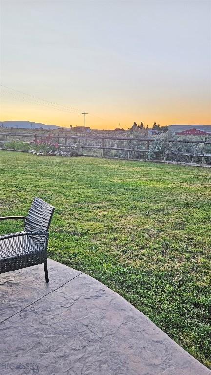 950 N Harrison St, Lima, MT 59739 - view of green lawn featuring a patio