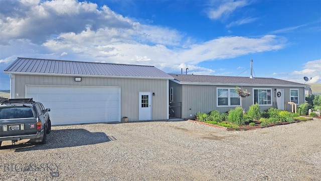 950 N Harrison St, Lima, MT 59739 - ranch-style home with driveway, a garage, and a metal roof