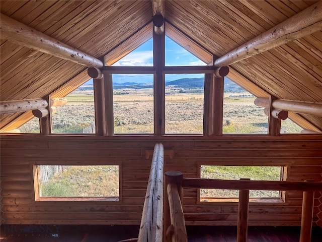 7223 Birdseye Rd, Helena, MT 59602 - detailed view of rustic walls and a wood ceiling with exposed beams