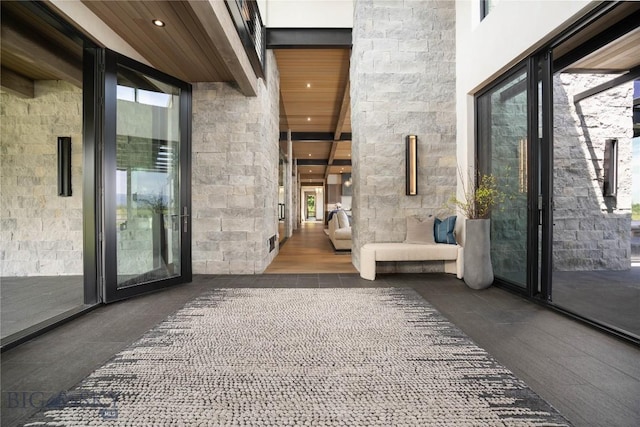 240 Horsetail Rd, Bozeman, MT 59715 - corridor with healthy amount of natural light, wood ceiling, a high ceiling, and recessed lighting
