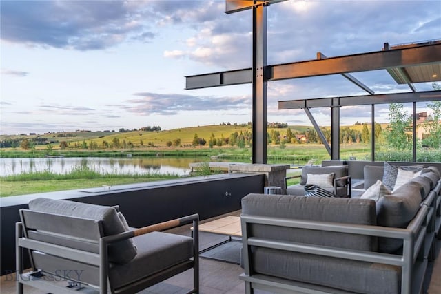 240 Horsetail Rd, Bozeman, MT 59715 - view of patio with outdoor lounge area and a water view