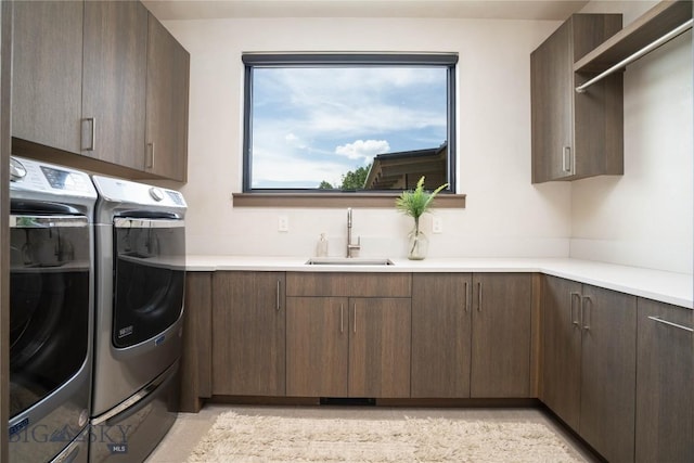 240 Horsetail Rd, Bozeman, MT 59715 - laundry area with washing machine and clothes dryer and cabinet space