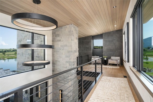 240 Horsetail Rd, Bozeman, MT 59715 - corridor with wood finished floors, recessed lighting, wooden ceiling, and a water view