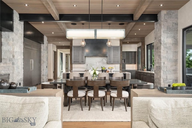240 Horsetail Rd, Bozeman, MT 59715 - kitchen featuring light wood-style flooring, a wood ceiling with exposed beams, exhaust hood, light countertops, and recessed lighting