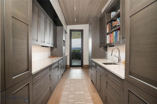 240 Horsetail Rd, Bozeman, MT 59715 - kitchen featuring light wood finished floors, light countertops, recessed lighting, open shelves, and wooden ceiling