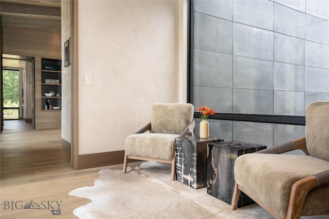 240 Horsetail Rd, Bozeman, MT 59715 - sitting room featuring baseboards and wood finished floors