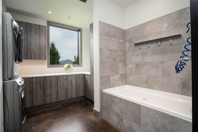 240 Horsetail Rd, Bozeman, MT 59715 - full bath featuring estacked washer and dryer and finished concrete flooring