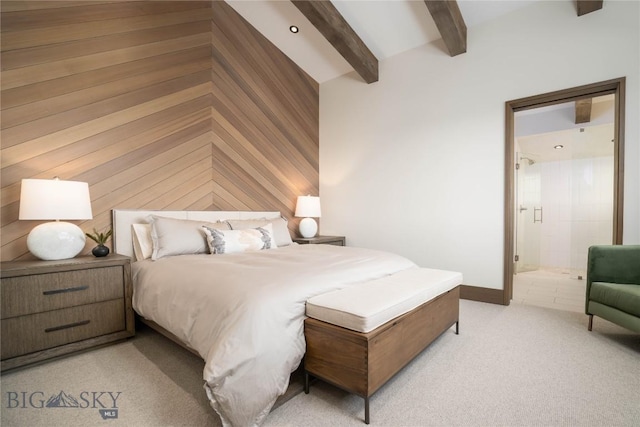 240 Horsetail Rd, Bozeman, MT 59715 - bedroom with ensuite bath, light carpet, and beamed ceiling