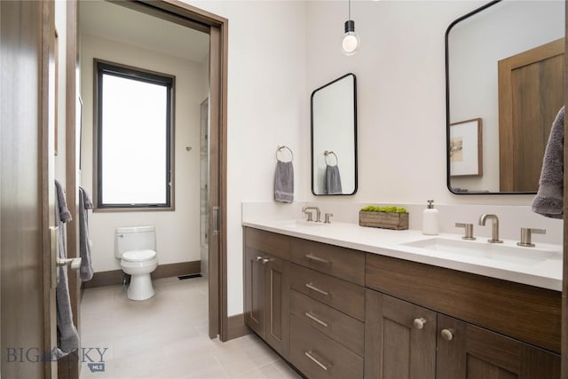 240 Horsetail Rd, Bozeman, MT 59715 - bathroom featuring double vanity and tile patterned flooring