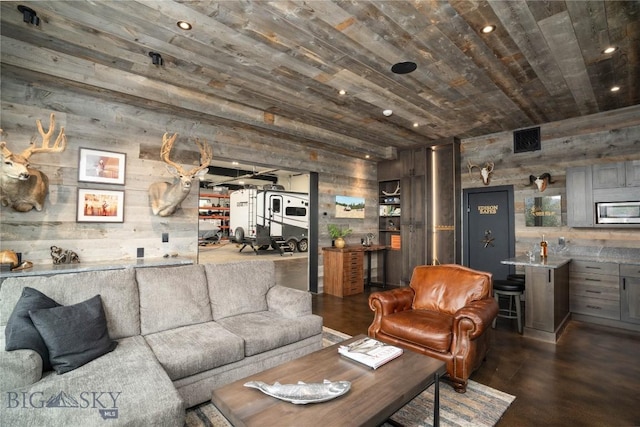 240 Horsetail Rd, Bozeman, MT 59715 - living area featuring wood ceiling, wooden walls, dark wood-style floors, recessed lighting, and a community bar