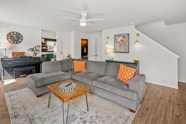119 Meadow Brook Ln, Belgrade, MT 59714 - living area featuring wood finished floors and a ceiling fan