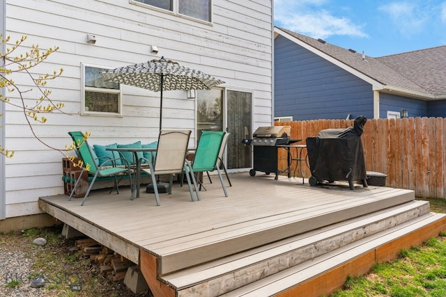 119 Meadow Brook Ln, Belgrade, MT 59714 - deck featuring grilling area and outdoor dining space