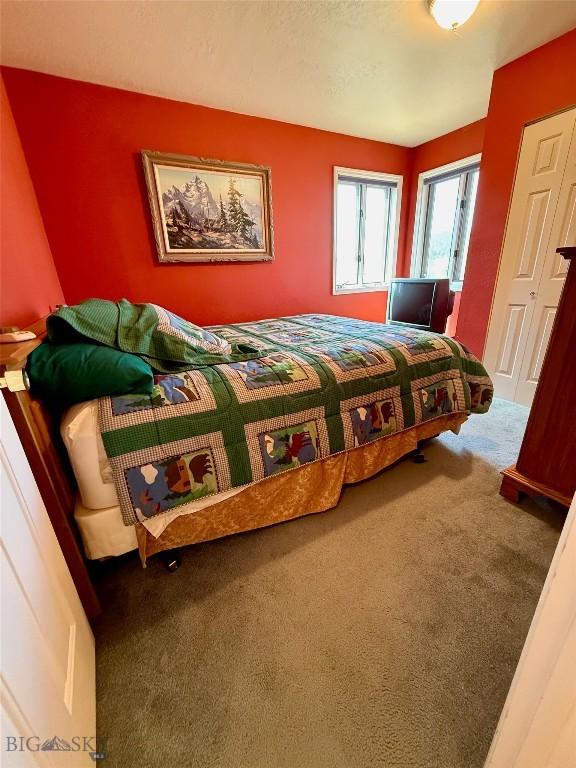 1364 Mcclellan Rd, West Yellowstone, MT 59758 - bedroom with carpet