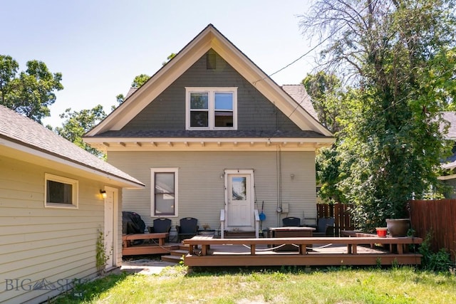 511 W Babcock, Bozeman, MT 59715 - rear view of house with a wooden deck and a shingled roof