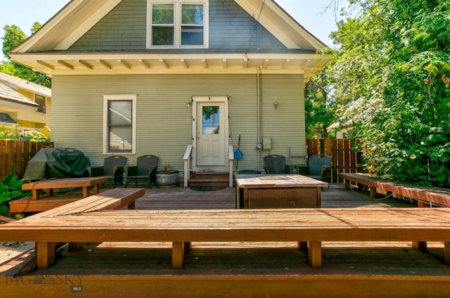 511 W Babcock, Bozeman, MT 59715 - rear view of property featuring a wooden deck and entry steps
