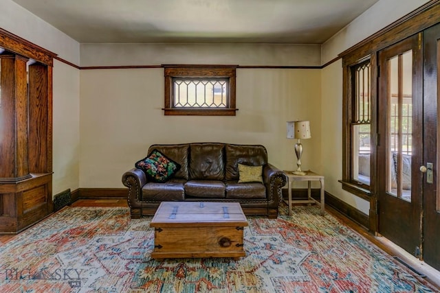 511 W Babcock, Bozeman, MT 59715 - living room featuring baseboards and wood finished floors