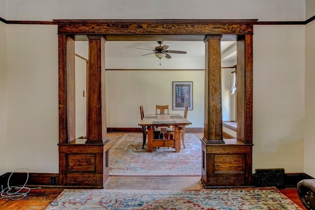 511 W Babcock, Bozeman, MT 59715 - dining area featuring a ceiling fan, ornamental molding, ornate columns, and wood finished floors