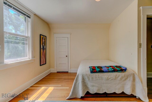 511 W Babcock, Bozeman, MT 59715 - bedroom featuring light wood-style floors and baseboards