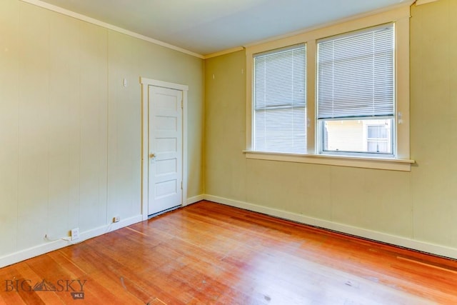 511 W Babcock, Bozeman, MT 59715 - spare room with wood finished floors and crown molding