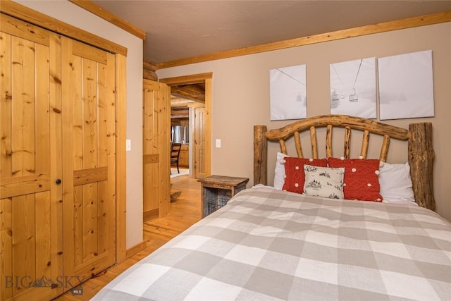 49824 Gallatin Rd, Big Sky, MT 59730 - bedroom featuring wood finished floors