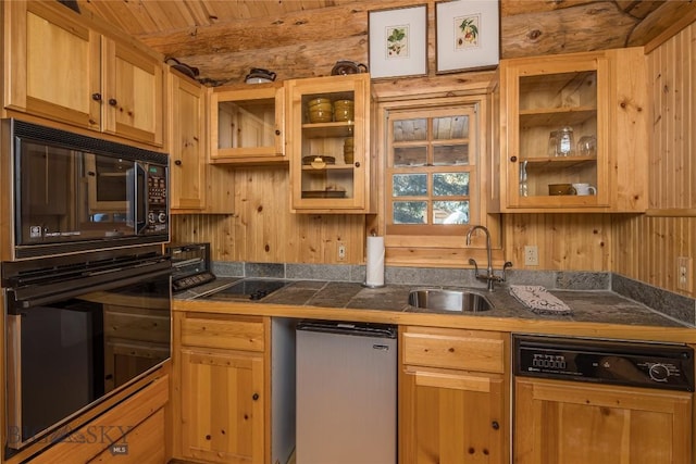 49824 Gallatin Rd, Big Sky, MT 59730 - kitchen with black appliances, glass insert cabinets, light brown cabinets, and wooden ceiling