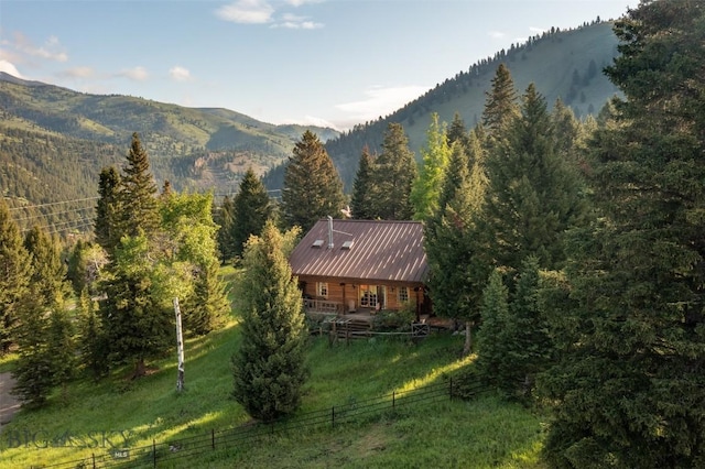 49824 Gallatin Rd, Big Sky, MT 59730 - mountain view featuring a heavily wooded area