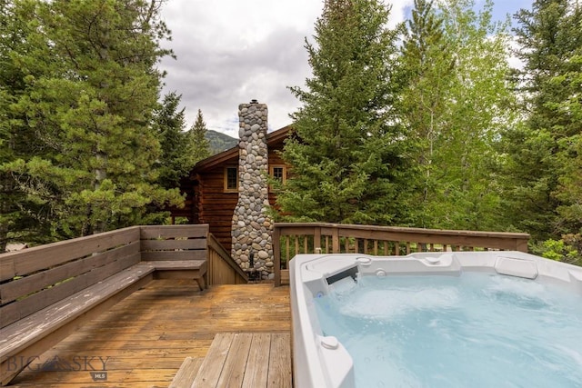 49824 Gallatin Rd, Big Sky, MT 59730 - deck featuring a hot tub