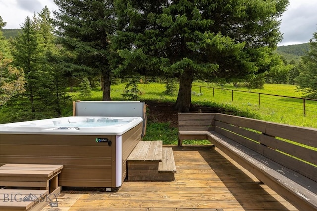 49824 Gallatin Rd, Big Sky, MT 59730 - wooden deck with a hot tub