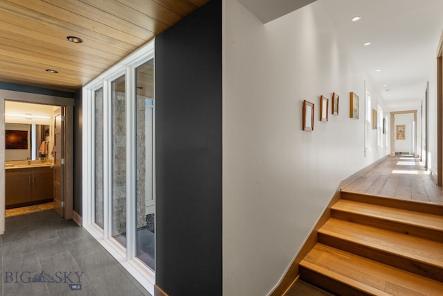 1878 Star Ridge Rd, Bozeman, MT 59715 - hallway with recessed lighting and dark tile patterned floors