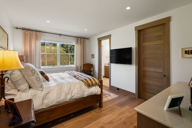 1878 Star Ridge Rd, Bozeman, MT 59715 - bedroom featuring light wood-style floors, recessed lighting, and ensuite bathroom