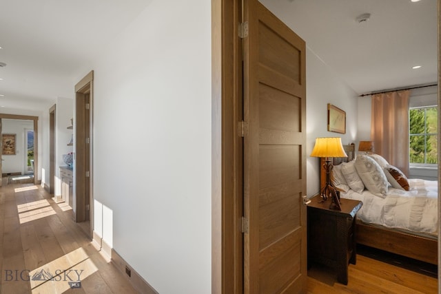1878 Star Ridge Rd, Bozeman, MT 59715 - corridor with light wood finished floors and baseboards
