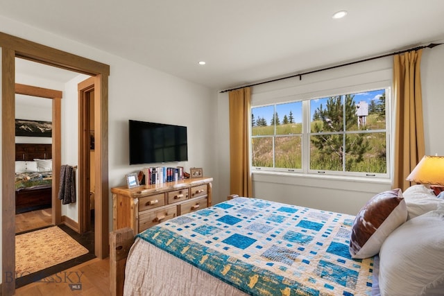 1878 Star Ridge Rd, Bozeman, MT 59715 - bedroom with wood finished floors and recessed lighting