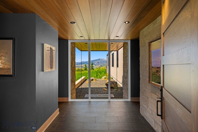1878 Star Ridge Rd, Bozeman, MT 59715 - hall featuring a mountain view, wood ceiling, and recessed lighting