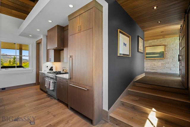 1878 Star Ridge Rd, Bozeman, MT 59715 - kitchen featuring high end range, wooden ceiling, recessed lighting, light wood-style floors, and light countertops