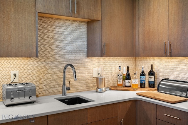 1878 Star Ridge Rd, Bozeman, MT 59715 - kitchen with backsplash and light countertops
