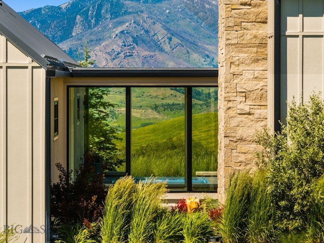 1878 Star Ridge Rd, Bozeman, MT 59715 - exterior view of stone siding and a mountain backdrop