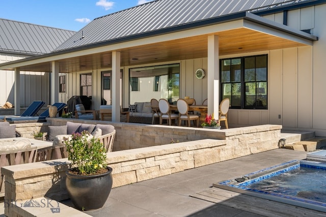 1878 Star Ridge Rd, Bozeman, MT 59715 - view of patio / terrace with a hot tub