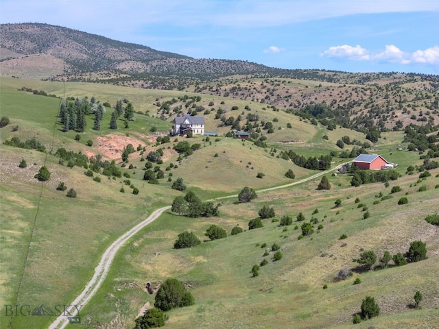 5835 Spaulding Bridge Rd, Belgrade, MT 59714 - overview of rural landscape featuring a mountain backdrop