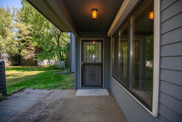 2200 W Dickerson Unit 46, Bozeman, MT 59718 - entrance to property featuring a yard and a patio area