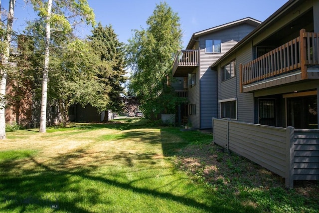 2200 W Dickerson Unit 46, Bozeman, MT 59718 - view of grassy yard with a balcony