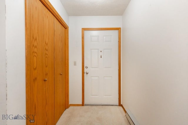 2200 W Dickerson Unit 46, Bozeman, MT 59718 - entryway featuring light carpet and baseboards