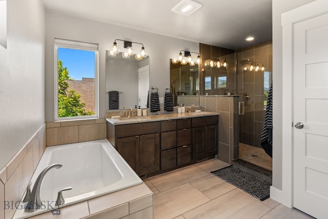 3139 Blackbird Dr, Bozeman, MT 59718 - full bath with double vanity, a shower stall, and a garden tub