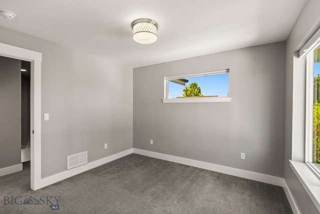 3139 Blackbird Dr, Bozeman, MT 59718 - empty room featuring a smoke detector and dark carpet