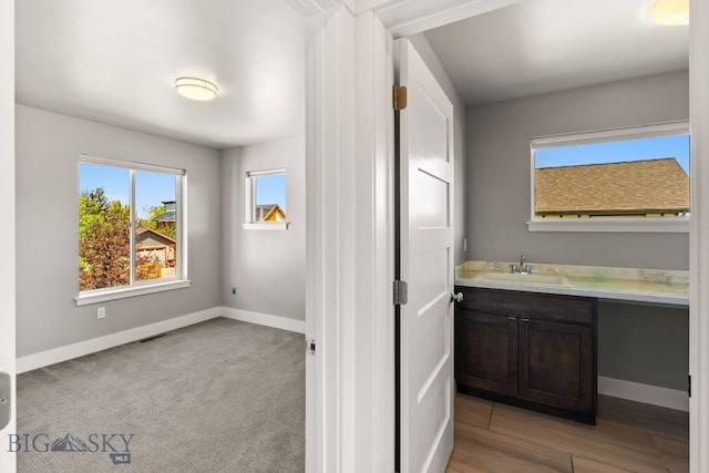3139 Blackbird Dr, Bozeman, MT 59718 - bathroom with baseboards and vanity