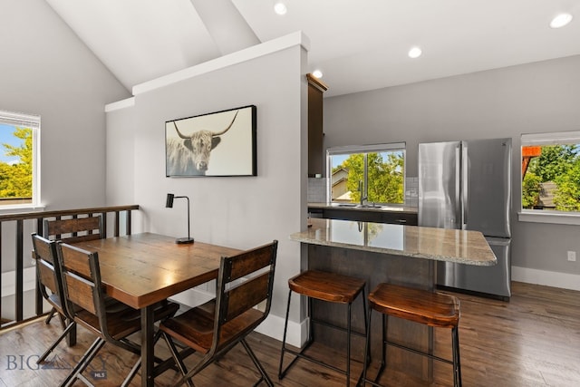 3139 Blackbird Dr, Bozeman, MT 59718 - dining space with recessed lighting, dark wood finished floors, and vaulted ceiling