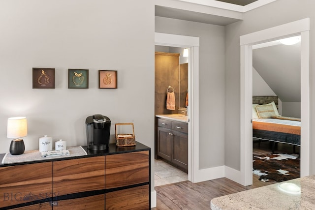 3139 Blackbird Dr, Bozeman, MT 59718 - bedroom with light wood finished floors and ensuite bathroom