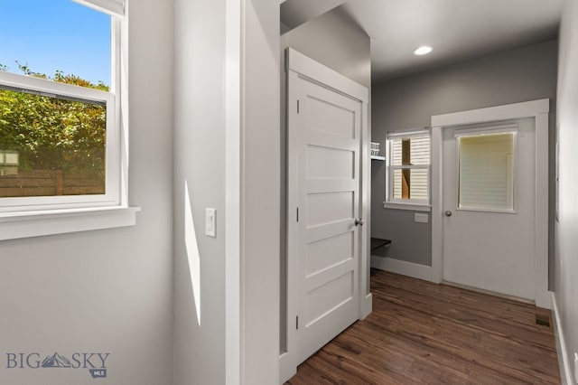 3139 Blackbird Dr, Bozeman, MT 59718 - hallway with dark wood finished floors, healthy amount of natural light, and recessed lighting